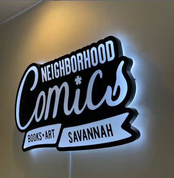 Book Art cut to shape lightbox sign