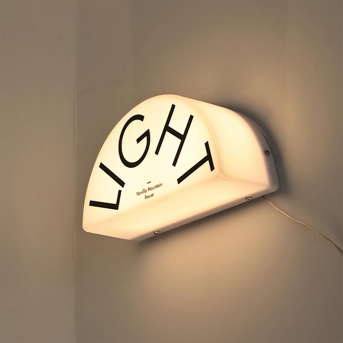 Light cut to shape lightbox sign