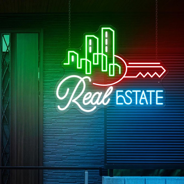 Modern property branding sign above a sofa lounge